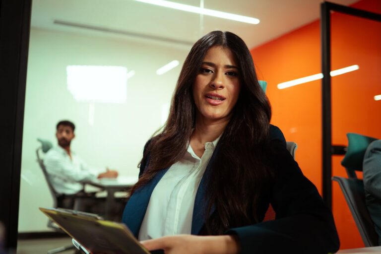 Female entrepreneur discussing with investors