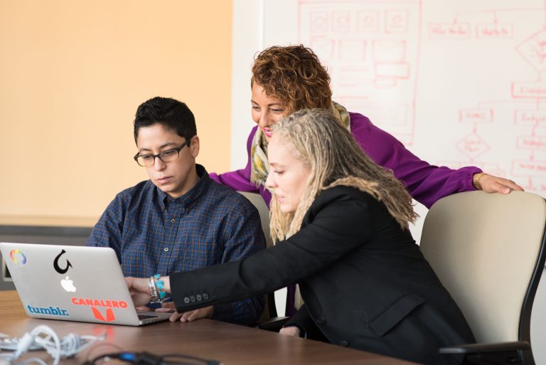 Women Founders Report Funding Access as Primary Growth Barrier Despite Record Recognition 1 Professional women providing business mentorship and guidance
