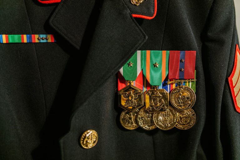 Women Leaders Consolidate Wealth and Power as Government Rejects Diversity Metrics 1 Male and female military personnel in formal dress uniforms