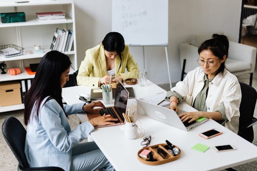 Benue State and Northern Ireland Deploy Parallel Funding Drives for Women Entrepreneurs 1 female business owners collaborating on digital business ventures