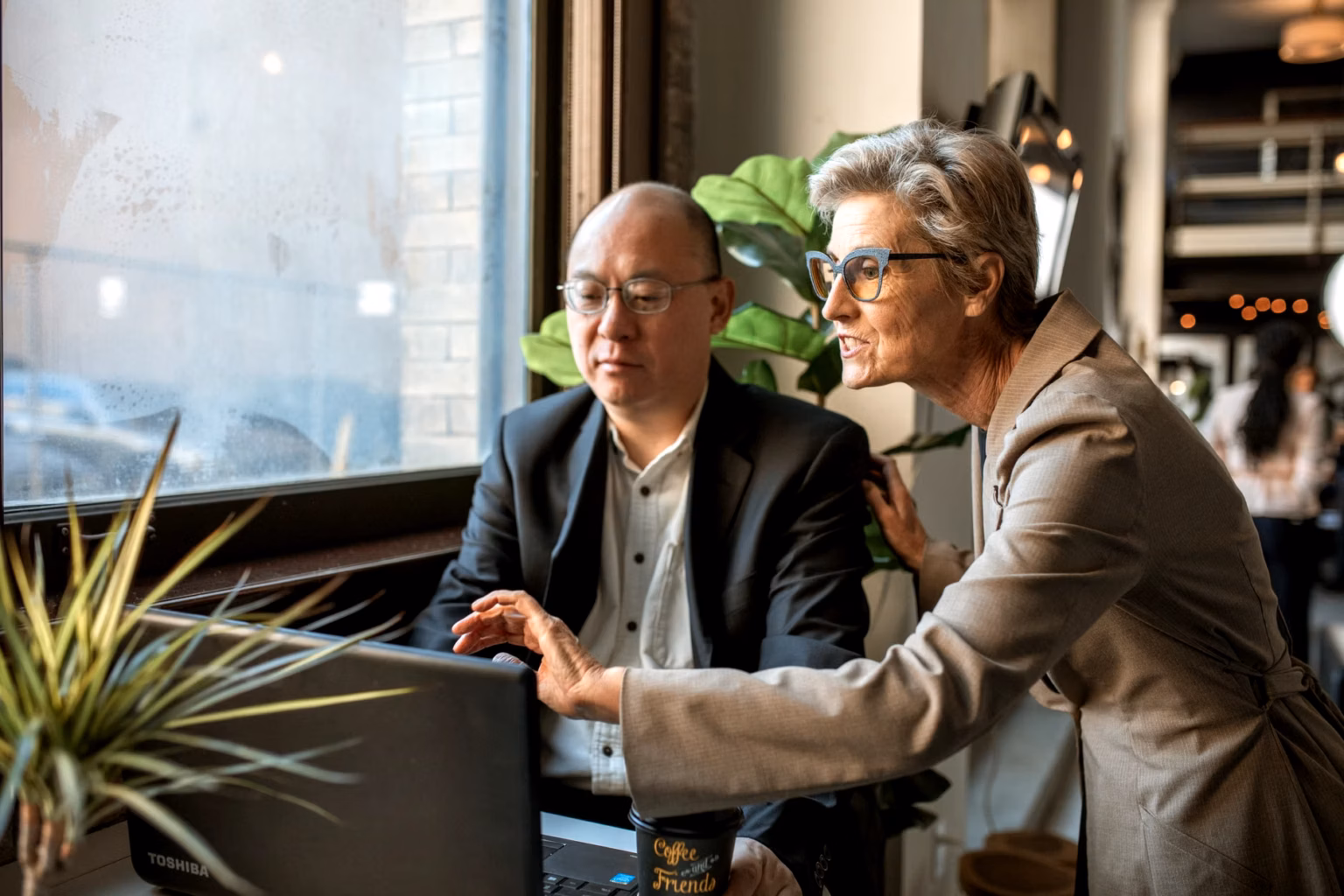diverse entrepreneurs at desks managing small firms