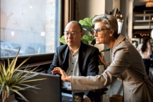 diverse entrepreneurs at desks managing small firms