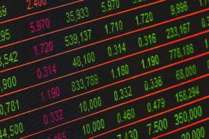 Indian stock market rally with green trading screens and financial data