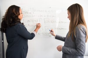 women working on business strategy in modern office