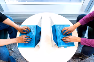 Female innovators collaborating on emerging technology projects