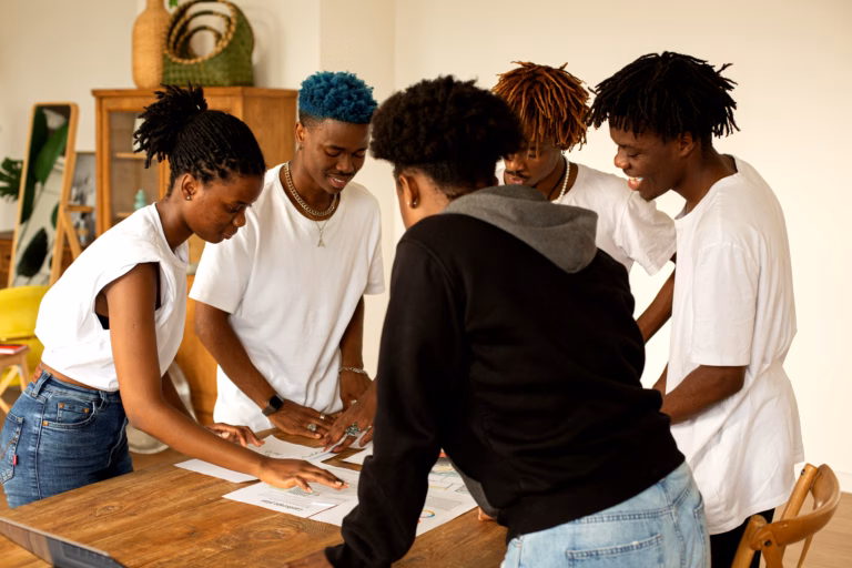 Young professionals collaborating at a business workshop in an urban setting