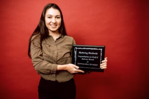 Woman executive receives professional recognition at an awards ceremony