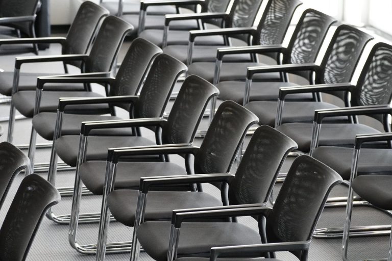 Women Take CEO Seats at Susan G. Komen, Driscoll's and Girls Who Code 1 Chairs, furniture, rows, and conference