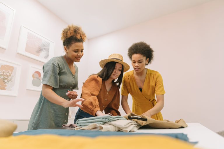 Women running a small fashion boutique