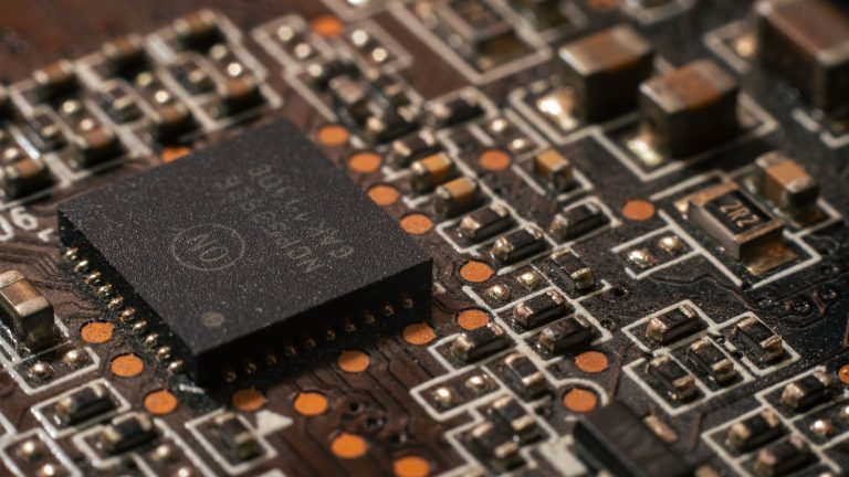 Fei-Fei Li Sells World Labs to AMD in $8.2 Billion Deal Led by Two Women 1 Close-up of a semiconductor processor chip