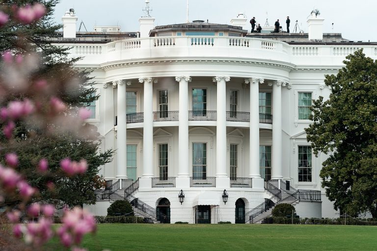 South facade of the White House with flowering trees