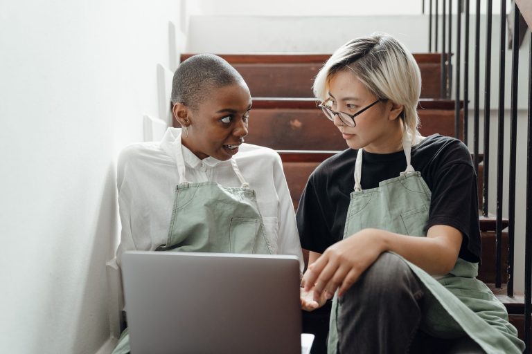Her Startup Cohort 2.0 Opens Applications to African Women Founders 2 Two women in aprons work together on a laptop